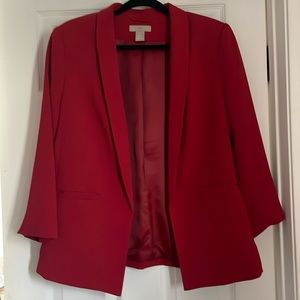 Slightly worn red blazer in size 10